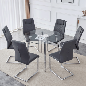 Table and chair set.A Modern Minimalist Round dining table with Transparent Tempered Glass top and silver metal legs